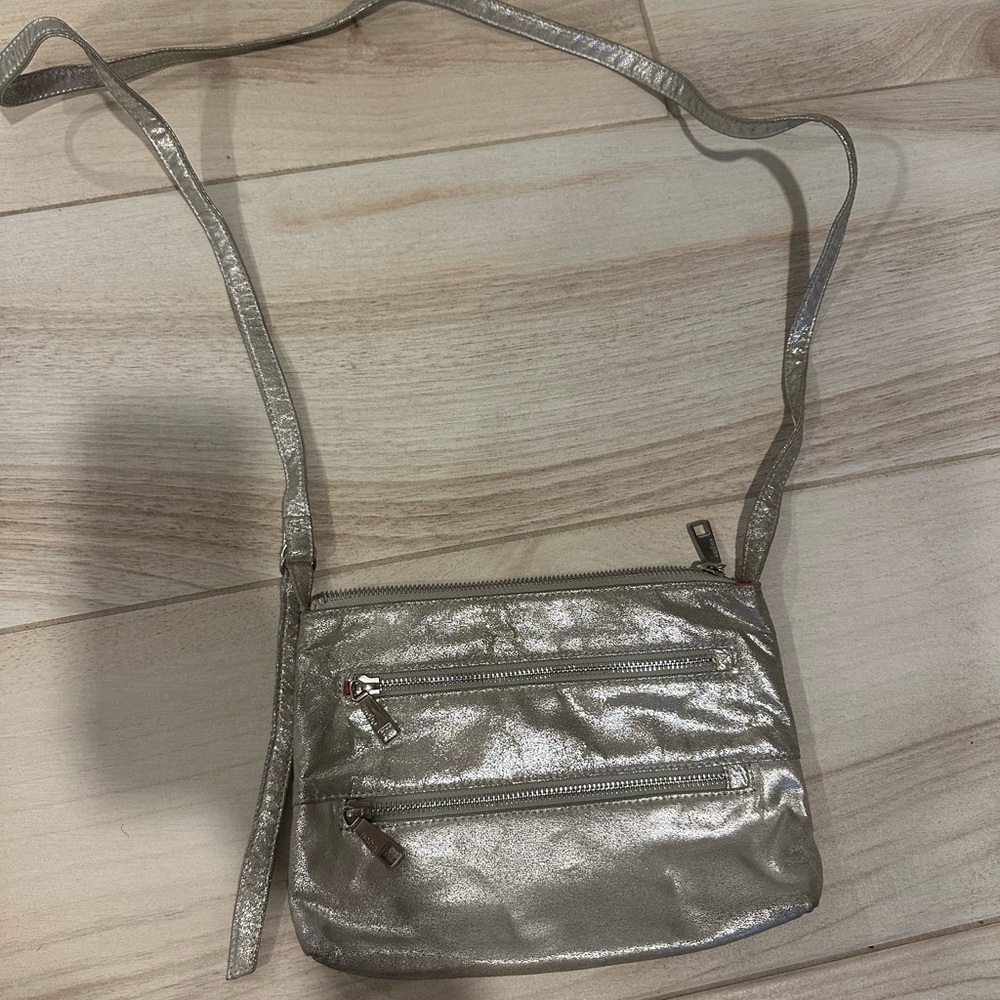 HOBO Silver Crossbody Bag with Sleek Design